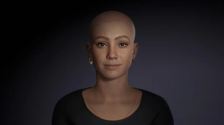 EVE’s finished face without hair, lit against a dark background